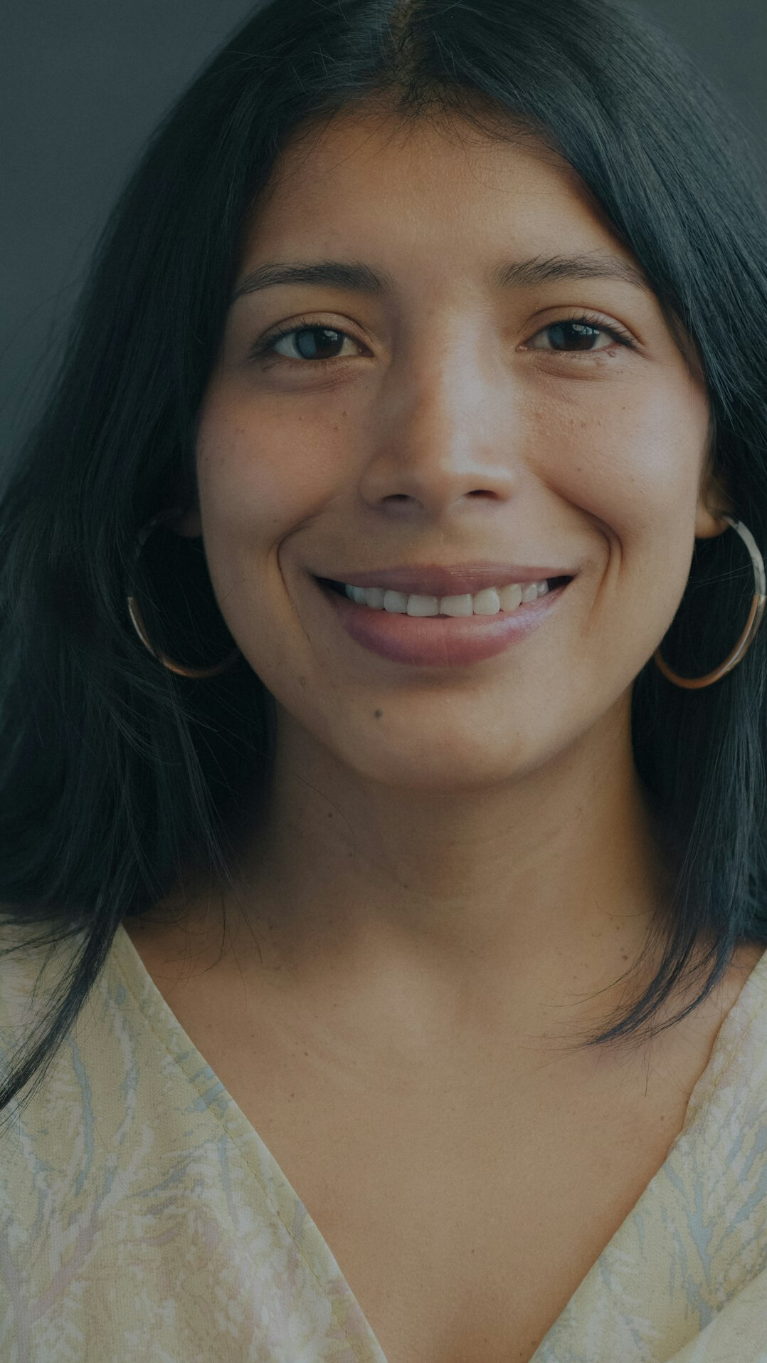 Portrait of a Latin American female photo editor