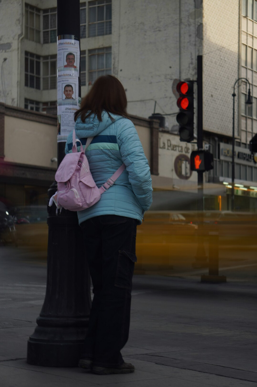 pedestrians waiting at crosswalk