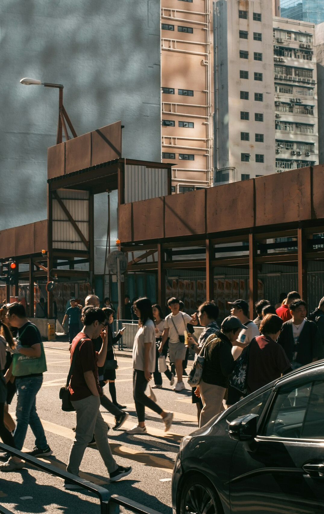 crowd crossing city street
